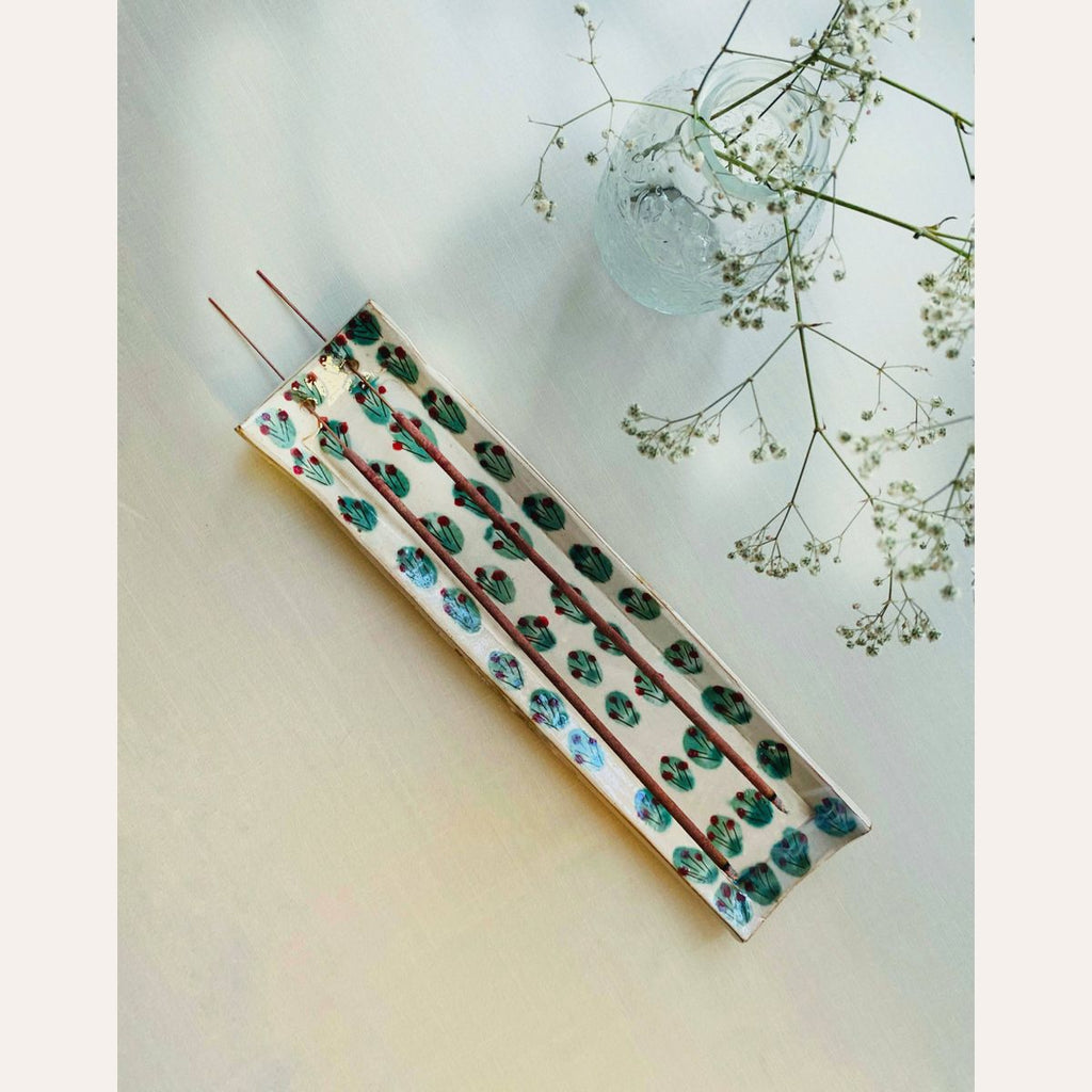 Hand-painted pottery incense holder with decorative pattern